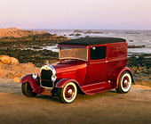 AUT 26 RK0187 02
1929 Ford Sedan Delivery 350 Burgundy 3/4 Side View On Sand By Rocks And Ocean Filtered