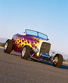 AUT 26 RK0220 01
1932 Ford Hi-Boy Roadster Purple With Flames Slanted Front 3/4 View On Pavement