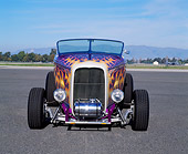 AUT 26 RK0224 16
1932 Ford Hi-Boy Roadster Purple With Flames Head On Shot On Pavement