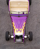 AUT 26 RK0226 11
1932 Ford Hi-Boy Roadster Purple With Flames Overhead Detail On Pavement