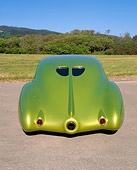 AUT 26 RK0236 03
1948 Buick Roadmaster Green Custom Rear View On Pavement By Grass And Bushes Blue Sky