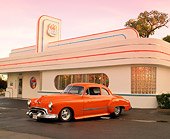 AUT 26 RK0242 03
1949 Oldsmobile Coupe ProStreet Orange Front 3/4 View On Pavement By Diner