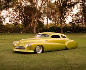 AUT 26 RK0245 02
1948 Buick Roadmaster Custom Green 3/4 Front View On Grass By Trees