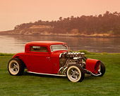 AUT 26 RK0252 05
1932 Ford Custom Hot Rod Red Side 3/4 View On Grass By Water Pebble Beach