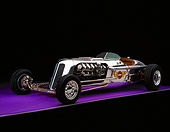 AUT 26 RK0271 08
Blastolene Special Concept Race Car 3/4 Front View On Purple Floor Gray Line Studio