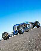 AUT 26 RK0282 03
Blastolene Special Concept Race Car Low Slanted 3/4 Front View On Pavement Blue Sky