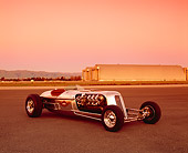 AUT 26 RK0286 02
Blastolene Special Concept Race Car 3/4 Front View On Pavement Airplane Hanger Background Filtered