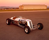 AUT 26 RK0289 02
Blastolene Special Concept Race Car 3/4 Front View On Pavement Airplane Hanger Filtered