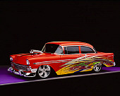 AUT 26 RK0293 07
1956 Chevrolet Bel Air Orange With Graphics 3/4 Front View Studio