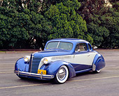 AUT 26 RK0361 03
1938 Chevrolet Business Coupe Blue And Gray 3/4 Front View On Pavement Trees Background