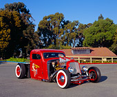 AUT 26 RK0365 01
1937 Chevy Rat Rod Red 3/4 Front View On Pavement By Trees