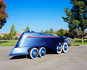 AUT 26 RK0433 05
1997 Soul Train Car Silver Front 3/4 View On Pavement By Grass And Trees