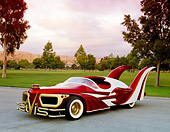 AUT 26 RK0442 04
1996 Elvis Presley Tribute Car 3/4 Front View On Pavement By Grass And Trees Filtered