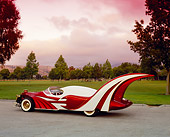 AUT 26 RK0445 03
1996 Elvis Presley Tribute Car 3/4 Rear View On Pavement By Grass And Trees Filtered