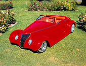 AUT 26 RK0450 03
1936 Ford Roadster Red Overhead 3/4 Front View On Grass In Flower Garden