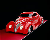 AUT 26 RK0486 06
1939 Ford Coupe Red With Flames 3/4 Front View Studio