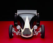 AUT 26 RK0538 24
1929 Ford Track Nose Roadster Black And Cream Head On Shot Red Floor Studio