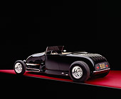 AUT 26 RK0540 15
1929 Ford Track Nose Roadster Black And Cream Rear 3/4 View On Red Floor Studio