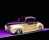 AUT 26 RK0545 07
1940 Ford Deluxe Opera Coupe Purple And Champagne 3/4 Front View On Purple Floor Studio