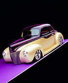 AUT 26 RK0547 07
1940 Ford Deluxe Opera Coupe Purple And Champagne Slanted 3/4 Front View On Purple Floor Studio