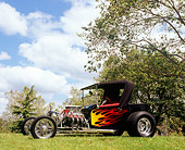 AUT 26 RK0559 01
1923 Ford Roadster Pick-Up Truck Black With Flames 3/4 Front View On Grass