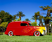 AUT 26 RK0579 01
1940 Mercury Delivery Sedan Red With Flames 3/4 Side View On Grass By Palm Trees