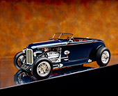 AUT 26 RK0596 08
1932 Speedway Special Roadster Blue 3/4 Side View On Mylar Floor Brown Mottled Background Studio
