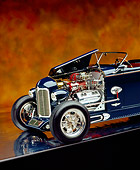 AUT 26 RK0601 02
1932 Speedway Special Roadster Blue Close Up 3/4 Front View On Hood Open Brown Mottled Studio