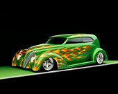 AUT 26 RK0648 01
1939 Ford Sedan Green With Flames 3/4 Side View On Green Floor Studio