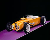 AUT 26 RK0651 03
1926 Ford Dore Roadster Orange 3/4 Front View On Purple Floor Studio