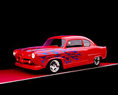 AUT 26 RK0657 07
1952 Kaiser Frazer Henry J Coupe Red With Flames 3/4 Side View On Red Floor Gray Line Studio