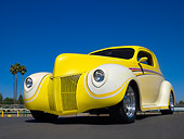 AUT 26 RK0685 01
1940 Ford 3 Window Coupe Art Himsil Yellow 3/4 Low Front View On Pavement