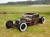AUT 26 RK1162 01
1930 Ford 5 Window Coupe Rusted 3/4 Front View On Marsh