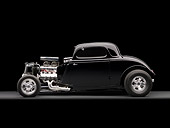 AUT 26 RK1178 01
1934 Ford 3 Window Coupe Black Profile View On Gray Floor Studio