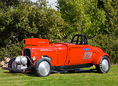 AUT 26 RK1210 01
1929 Ford Model A Hot Rod Salt Flats Racer Red Front 3/4 View On Grass By Trees