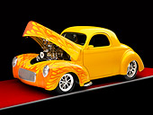AUT 26 RK1233 01
1941 Willys Coupe Yellow With Flames 3/4 Front View Studio
