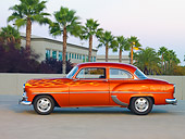 AUT 26 RK2674 01
1953 Chevrolet 210 Coupe Hot Rod Orange With Flames Profile View On Pavement By Palm Trees