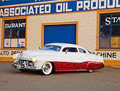 AUT 26 RK2675 01
1951 Mercury Coupe Custom Hot Rod Red And White 3/4 Front View On Pavement By Building