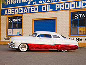 AUT 26 RK2676 01
1951 Mercury Coupe Custom Hot Rod Red And White 3/4 Front View On Pavement By Building