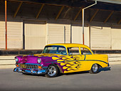 AUT 26 RK2684 01
1956 Chevrolet 210 Post Hot Rod Yellow Purple Flames 3/4 Front View On Pavement By Building