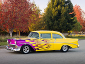 AUT 26 RK2692 01
1956 Chevrolet 210 Post Hot Rod Yellow Purple Flames 3/4 Front View On Pavement By Autumn Trees