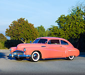 AUT 26 RK2745 01
1948 Buick Super Hot Rod Salmon 3/4 Front View On Pavement By Trees