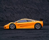 AUT 28 RK0003 05
1996 McLaren F1 LM Orange Profile View On Coal Field
