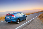 AUT 29 BK0004 01
2010 Honda Insight Blue 3/4 Rear View Driving On Road