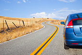 AUT 29 BK0006 01
2010 Honda Insight Blue Rear View Driving On Road
