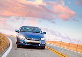 AUT 29 BK0013 01
2010 Honda Insight Blue Front View Driving On Road