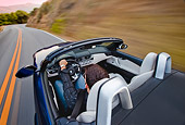 AUT 29 BK0017 01
2009 BMW Z4 Convertible Blue Driving On Road Overhead View