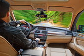 AUT 29 BK0024 01
2010 BMW X6 Sports Activity Vehicle Red Driving On Road