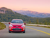 AUT 29 BK0033 01
2011 Ford Fiesta Red Front View On Road By Mountains