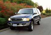 AUT 29 RK0005 07
1997 Ford Expedition Blue Front 3/4 View On Road In Motion